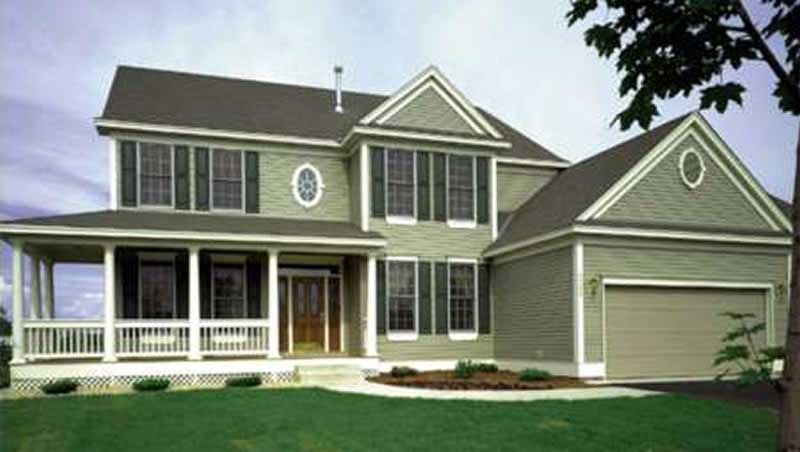 Front view of Country home (ThePlanCollection: House Plan #146-1993)