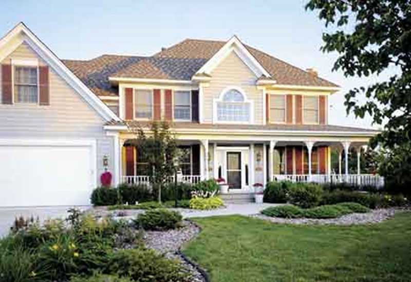 Front view of Country home (ThePlanCollection: House Plan #146-2288)