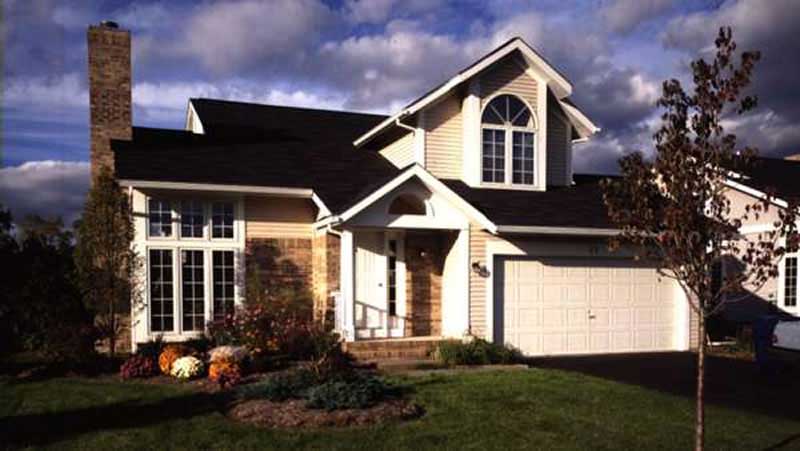 Front view of Country home (ThePlanCollection: House Plan #146-2494)