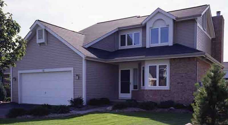 Front view of Contemporary home (ThePlanCollection: House Plan #146-2741)