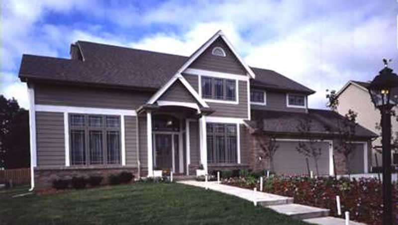 Front view of Country home (ThePlanCollection: House Plan #146-2794)