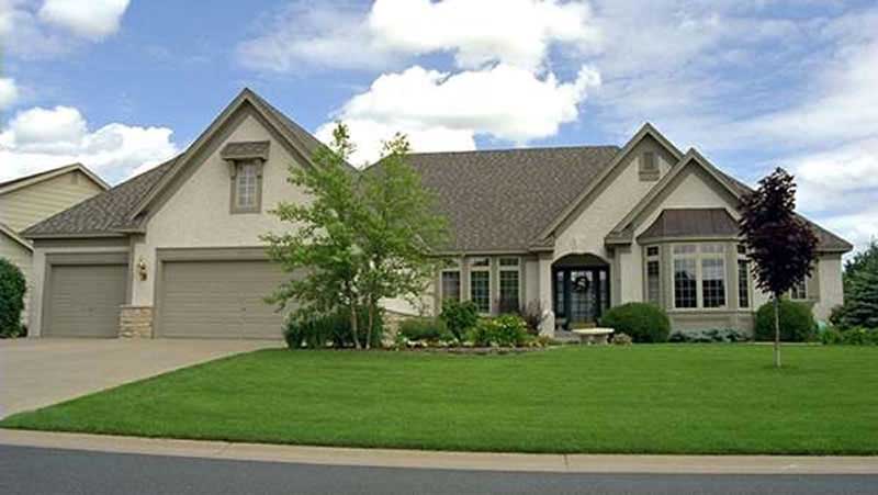 Front view of European home (ThePlanCollection: House Plan #146-2874)
