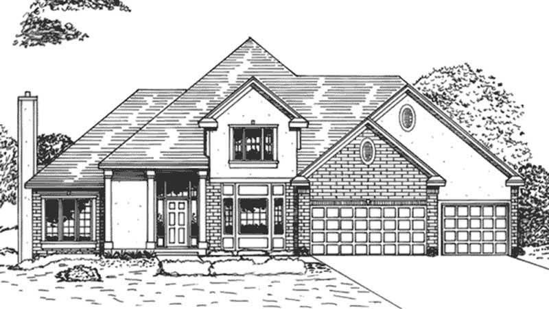 Front view of Colonial home (ThePlanCollection: House Plan #146-2942)