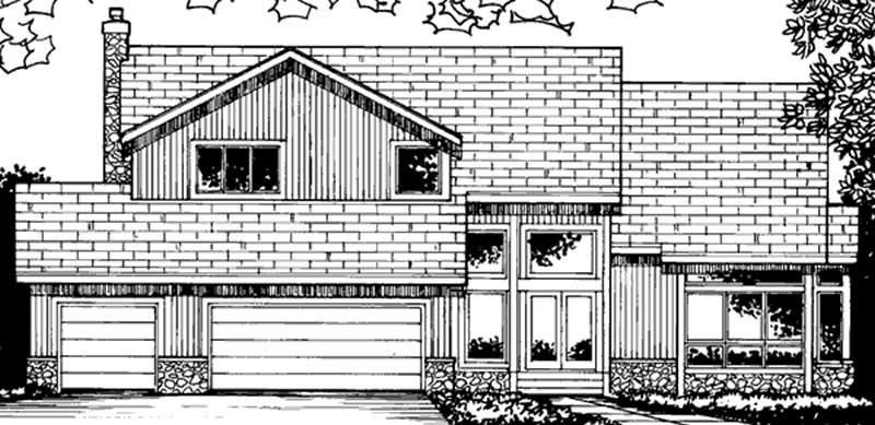Front view of Colonial home (ThePlanCollection: House Plan #146-2958)