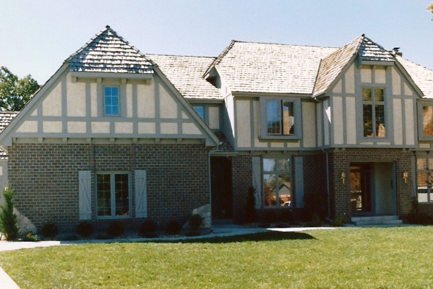 Color photograph of European home plan (ThePlanCollection: House Plan #147-1078)