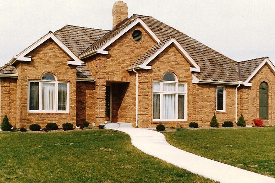 Color photo of European home plan (ThePlanCollection: House Plan #147-1101)
