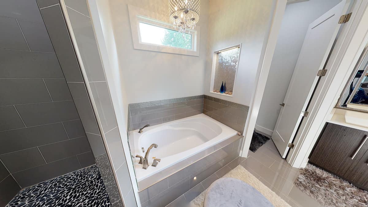 Master Bathroom: Tub of this 3-Bedroom,3374 Sq Ft Plan -153-1808