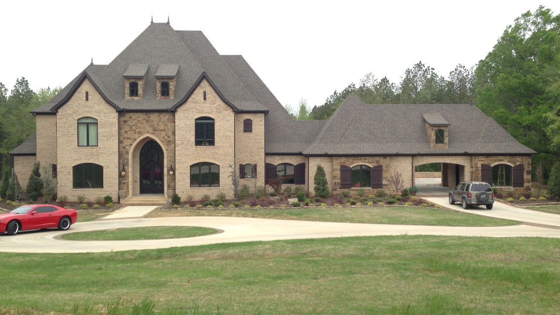 The Plan Collection: Front Elevation of European Style Luxury House # 153-1944