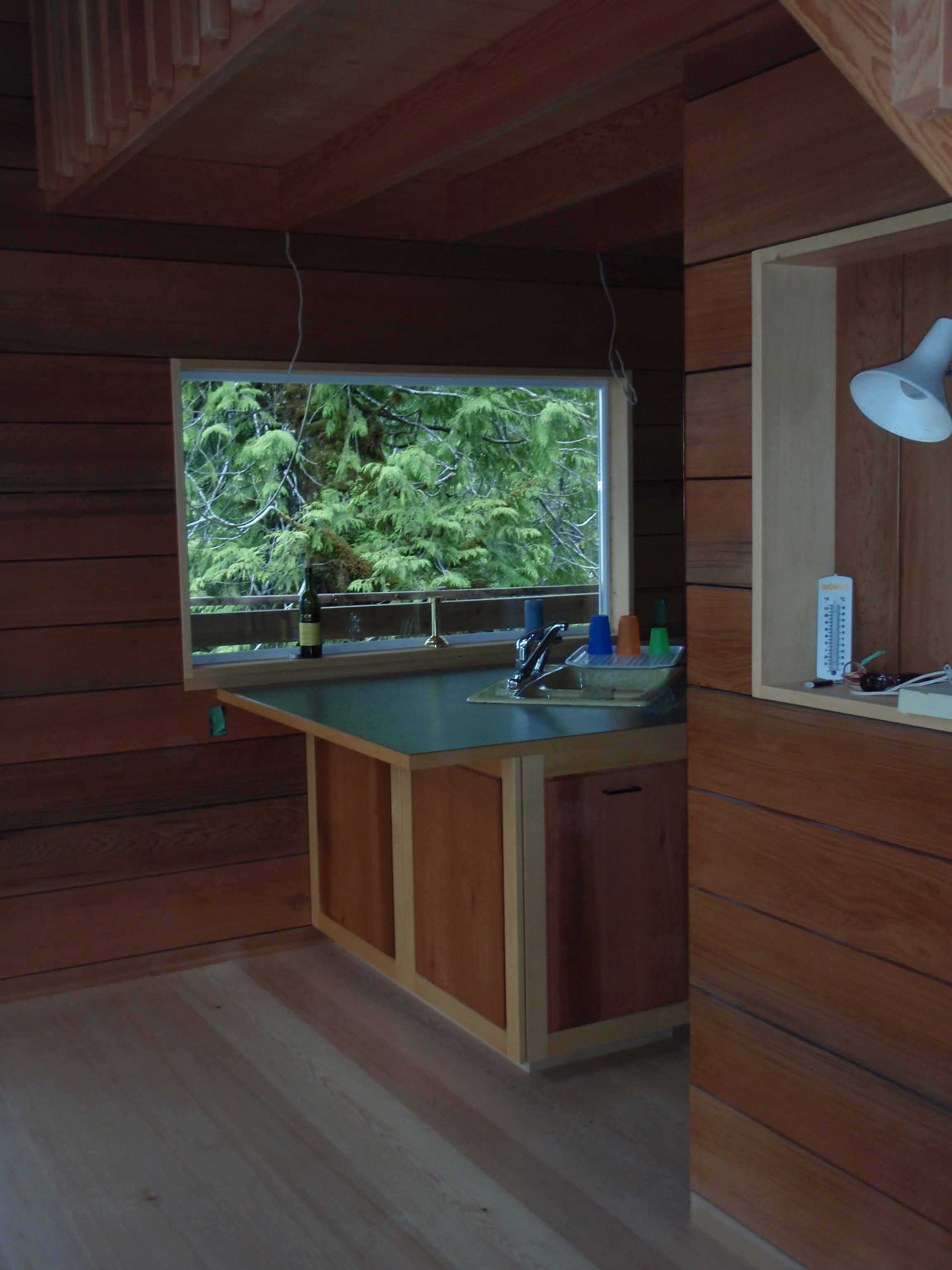 Kitchen: Breakfast Bar of this 1-Bedroom,582 Sq Ft Plan -160-1020