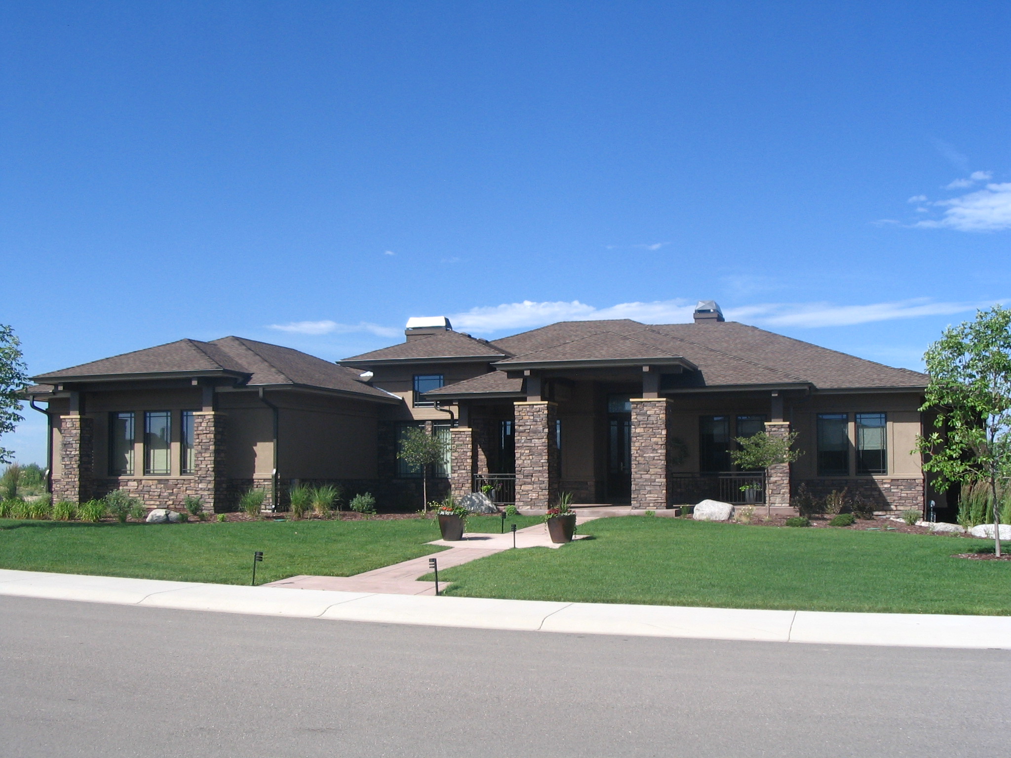 Front Elevation Photo of this Prairie House (#161-1058) at The Plan Collection.