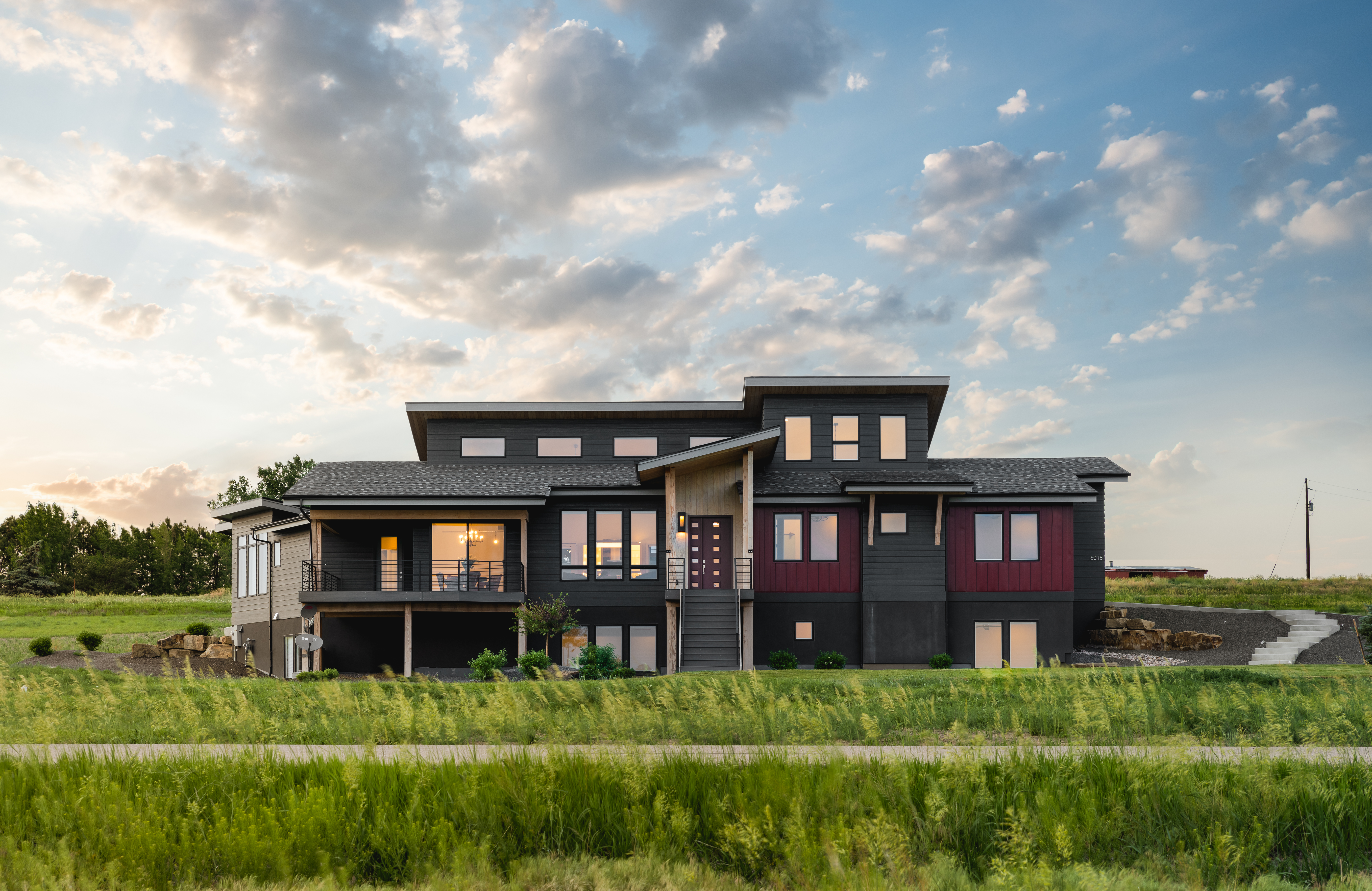 Front elevation of Luxury home (ThePlanCollection: House Plan #161-1179)