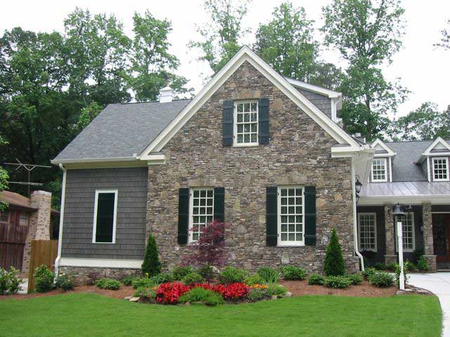This is a color photo for these Craftsman Home Plans.