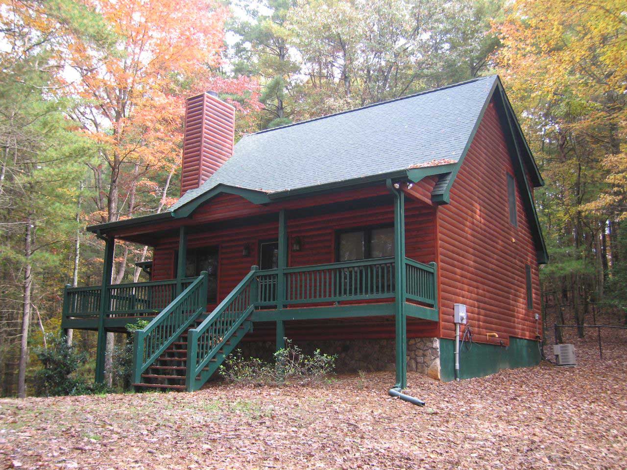 This is a color photo for these log cabin Home Plans.