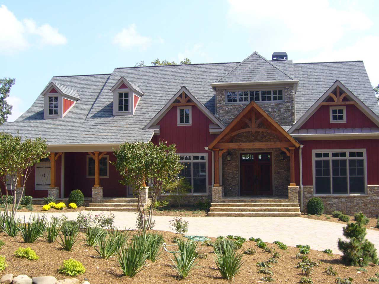 Color photograph of Craftsman home plan (ThePlanCollection: House Plan #163-1027)