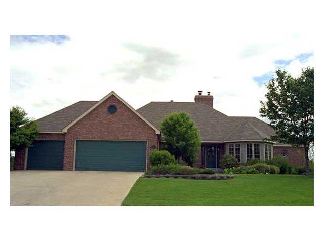 This is the front elevation of European Houseplans CLS-3302.