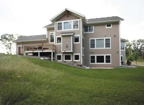 Home Plan Rear Elevation of this 4-Bedroom,3315 Sq Ft Plan -165-1019