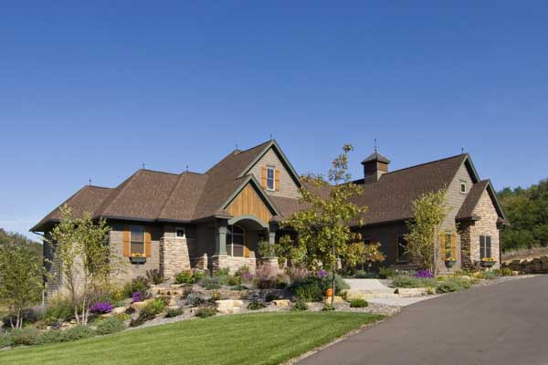 This photo shows the front elevation of European Home Plans CLS-4205.