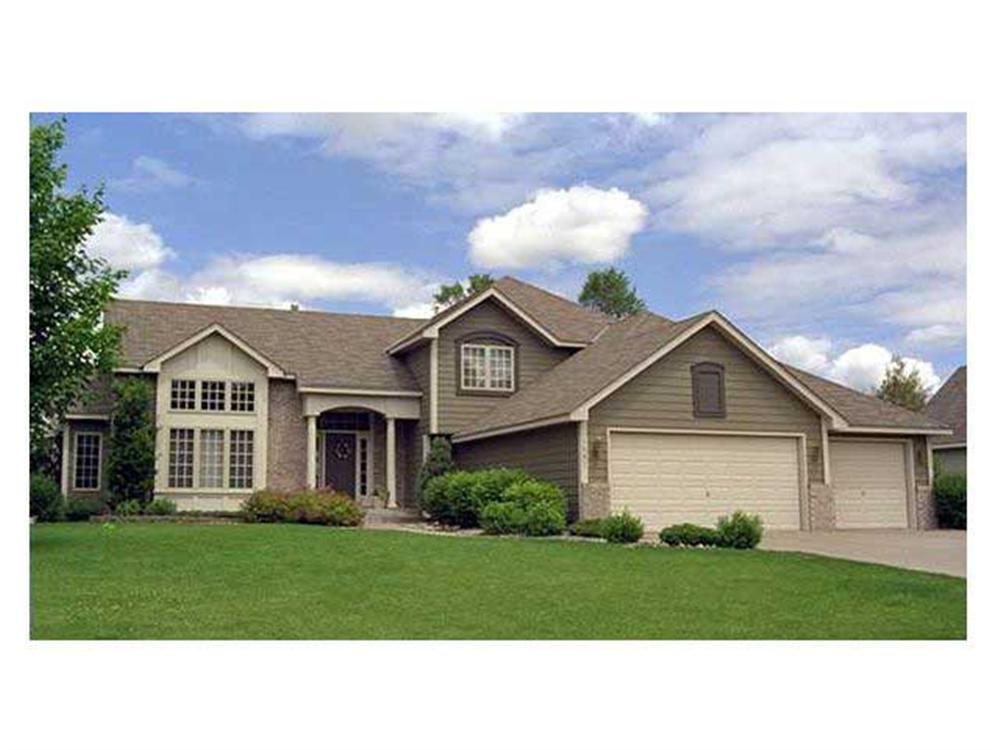 Color photograph of Country home plan (ThePlanCollection: House Plan #165-1135)
