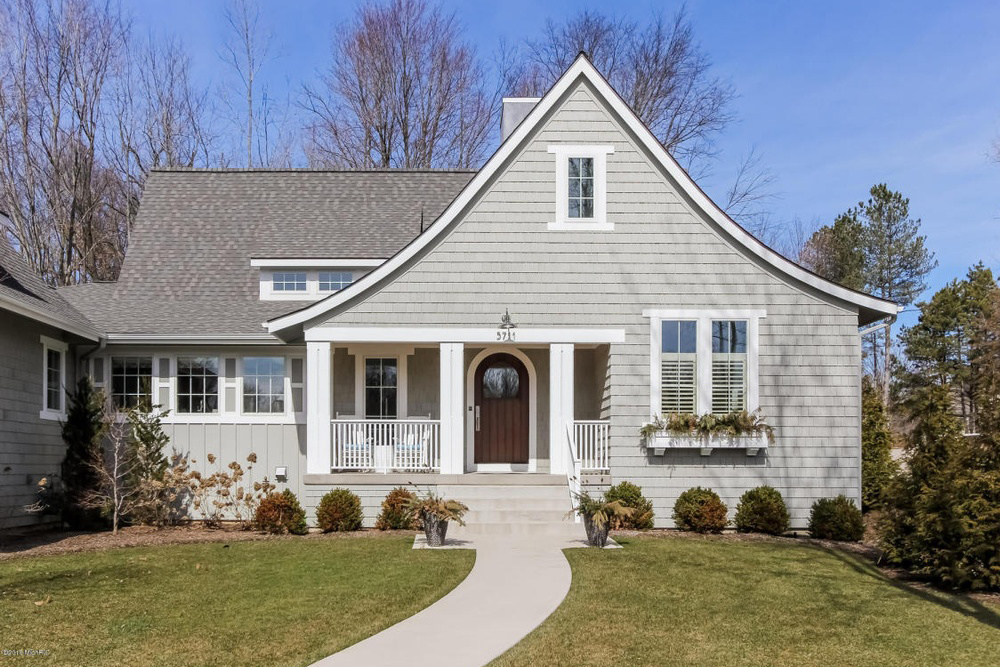 Front elevation of Shingle home (ThePlanCollection: House Plan #168-1131)