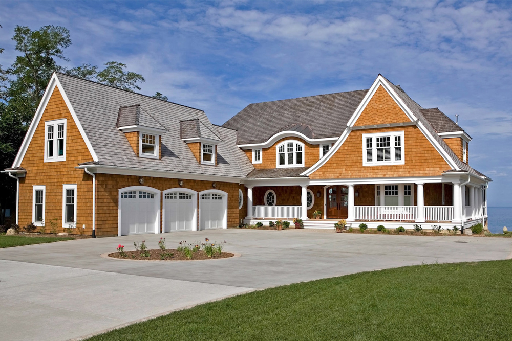 Front elevation of Shingle home (ThePlanCollection: House Plan #168-1132)