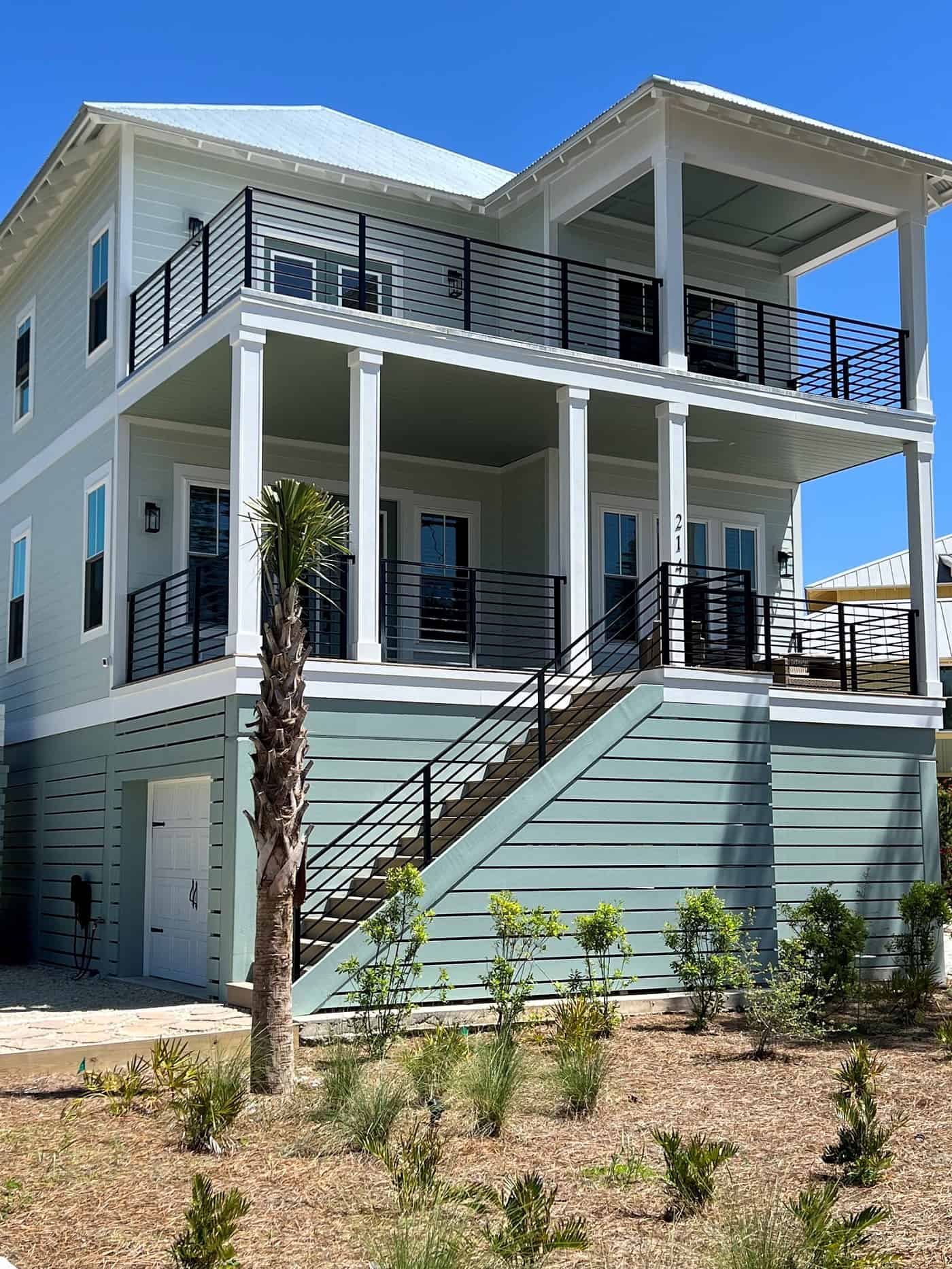 Front elevation of Beachfront home (ThePlanCollection: House Plan #168-1173)