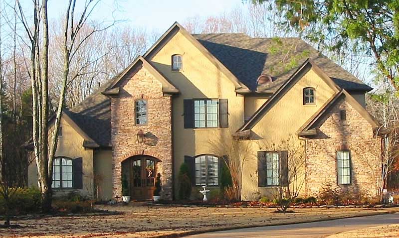 Front view of Luxury home (ThePlanCollection: House Plan #170-1021)