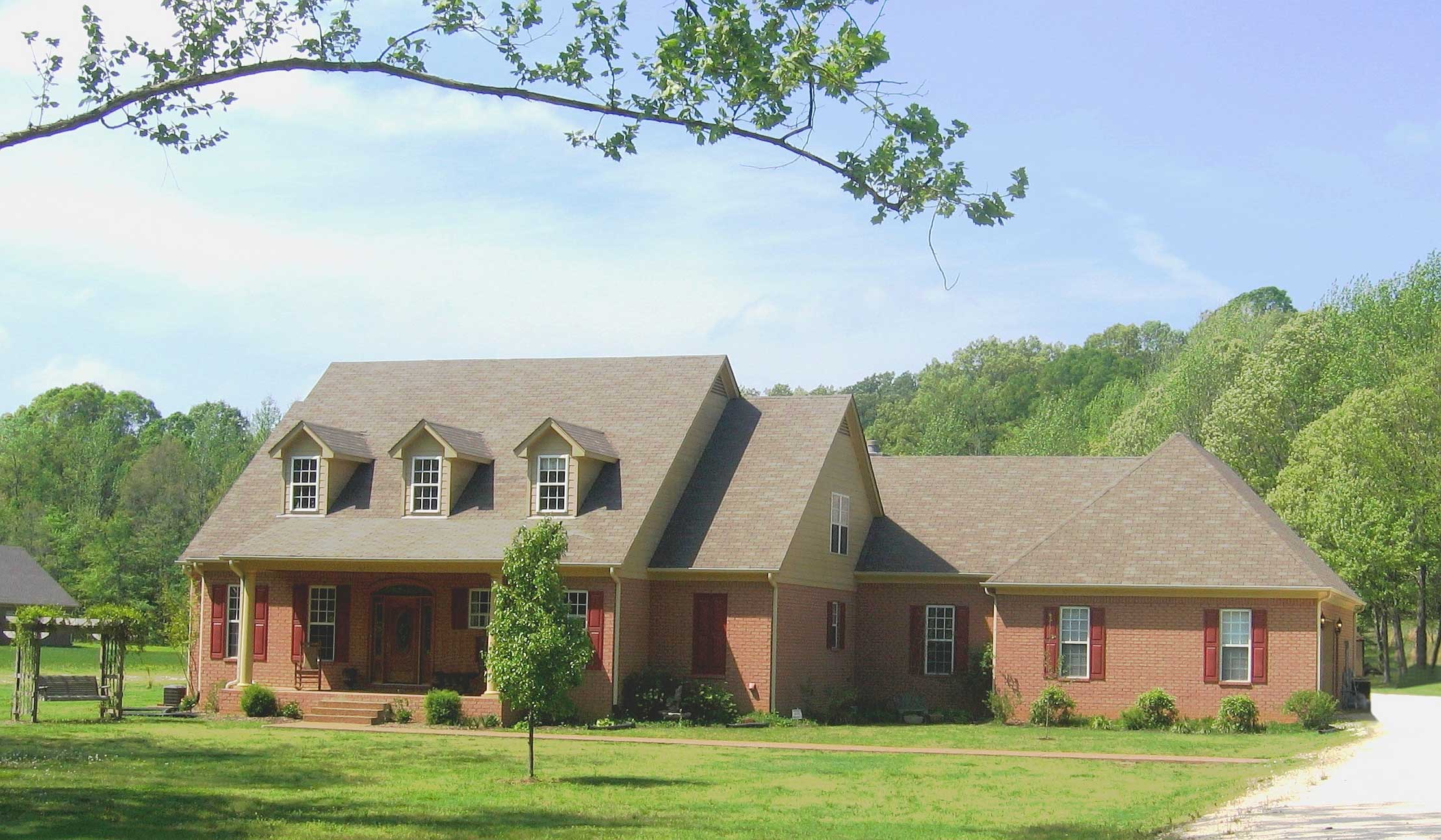 Front view of Luxury home (ThePlanCollection: House Plan #170-1072)