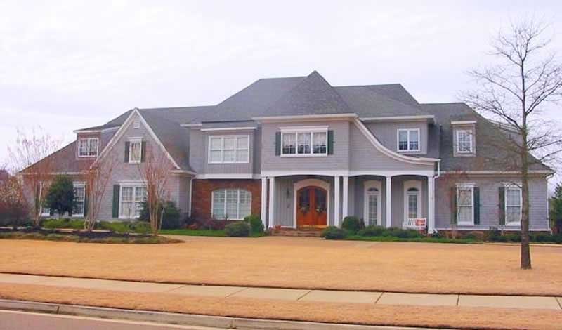 Front view of Luxury home (ThePlanCollection: House Plan #170-1233)