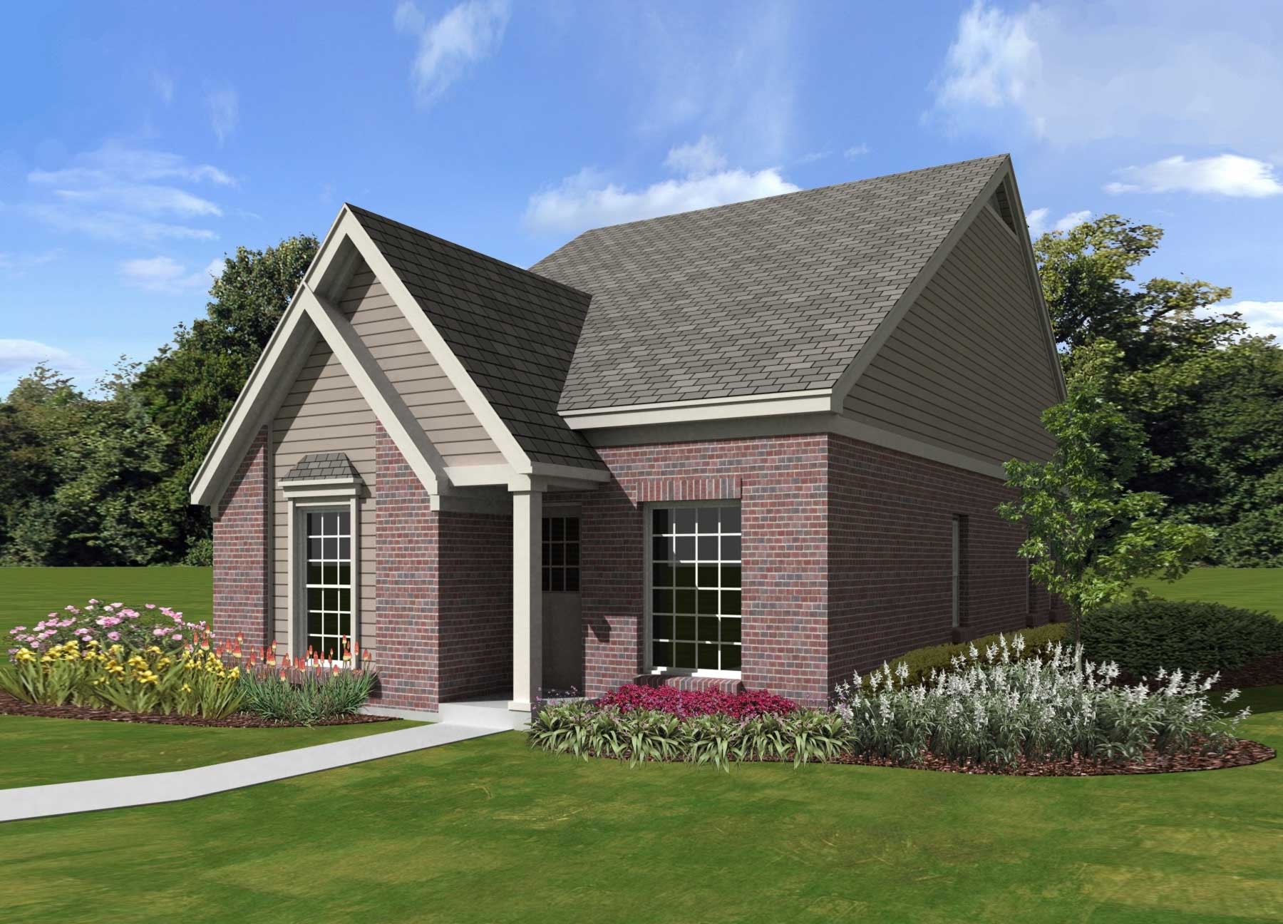 Front view of French home (ThePlanCollection: House Plan #170-1397)