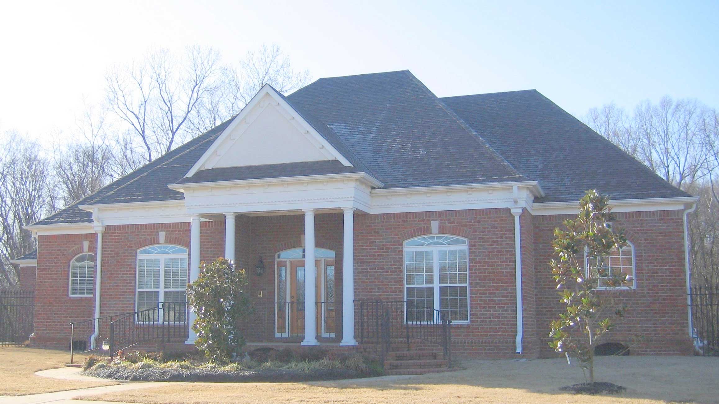 Front view of French home (ThePlanCollection: House Plan #170-1582)