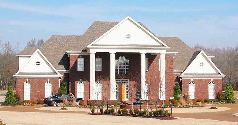Front view of Luxury home (ThePlanCollection: House Plan #170-1596)