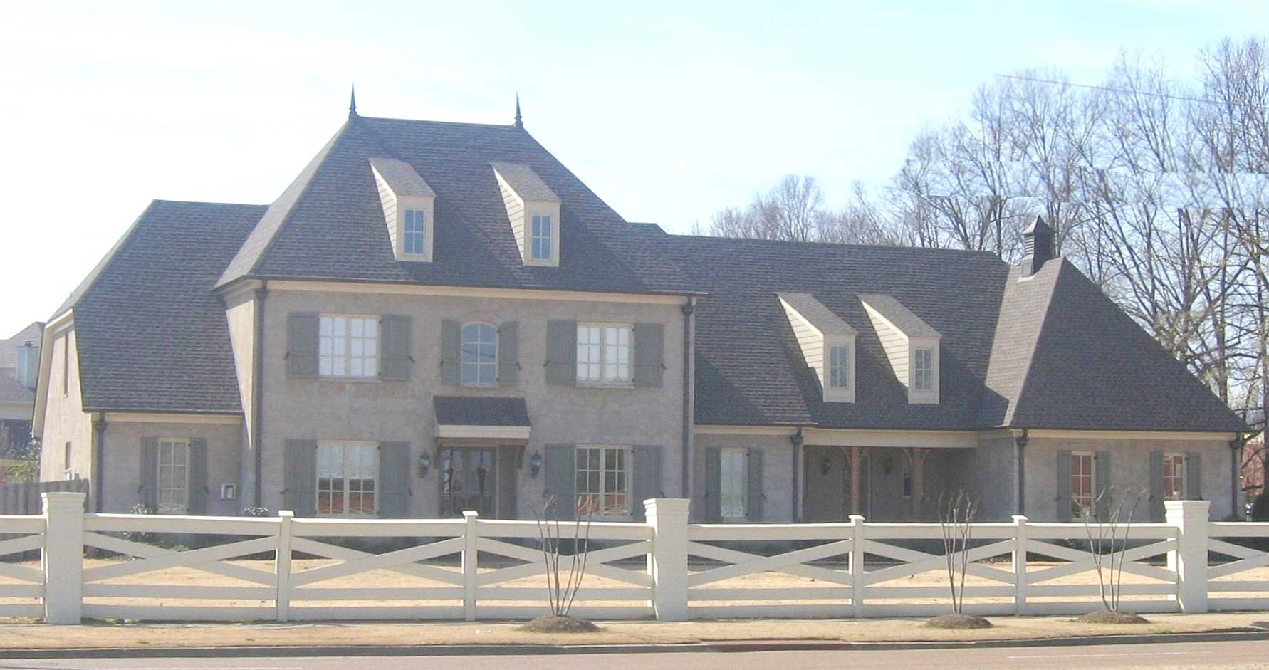 Front view of French home (ThePlanCollection: House Plan #170-1623)