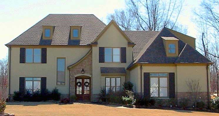 Front view of French home (ThePlanCollection: House Plan #170-1725)