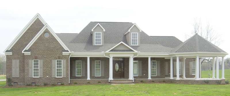Front view of Country home (ThePlanCollection: House Plan #170-1950)
