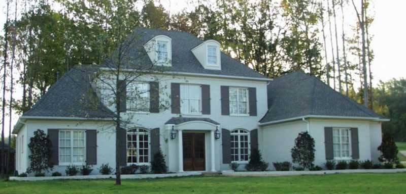 Front view of French home (ThePlanCollection: House Plan #170-2193)