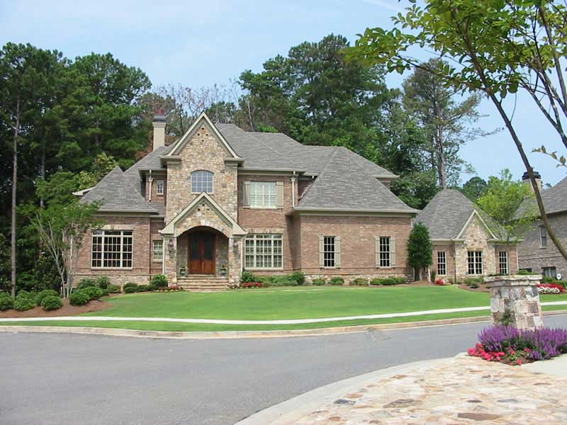 FRONT ELEVATION W/ STREET of this 4-Bedroom,4522 Sq Ft Plan -4522