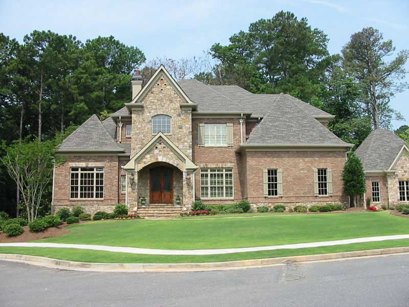 FRONT ELEVATION W/ STREET of this 4-Bedroom,4522 Sq Ft Plan -4522