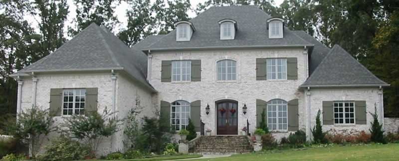 Front view of French home (ThePlanCollection: House Plan #170-2503)