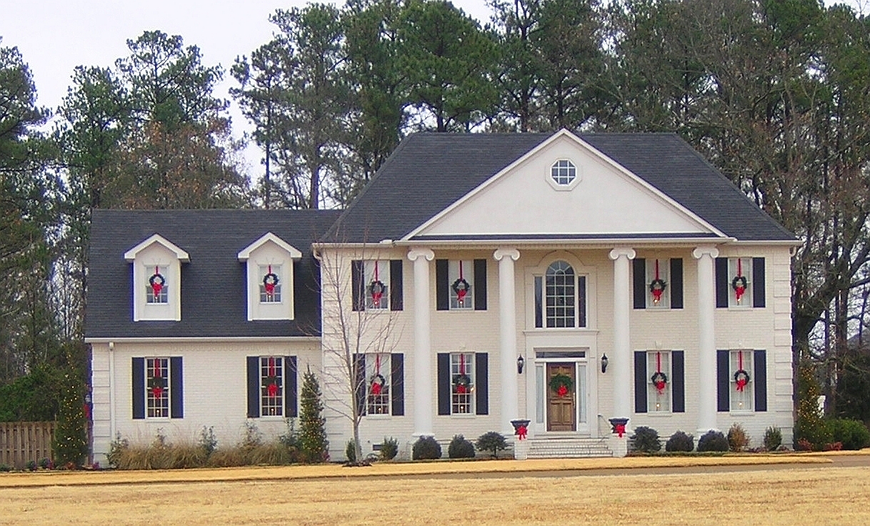 Front view of Colonial home (ThePlanCollection: House Plan #170-2549)
