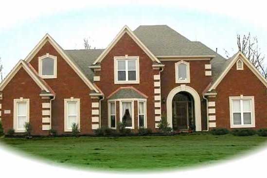 Front view of European home (ThePlanCollection: House Plan #170-2983)