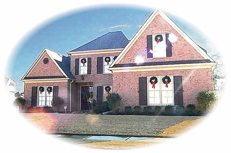 Front view of French home (ThePlanCollection: House Plan #170-3011)