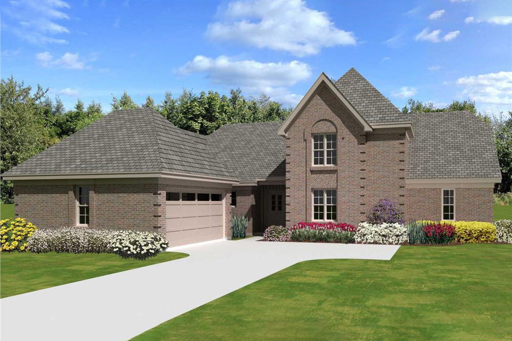 Front view of French home (ThePlanCollection: House Plan #170-3338)
