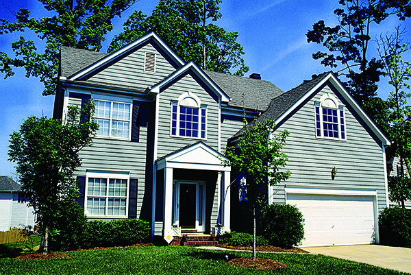 Front elevation of Traditional home (ThePlanCollection: House Plan #180-1004)