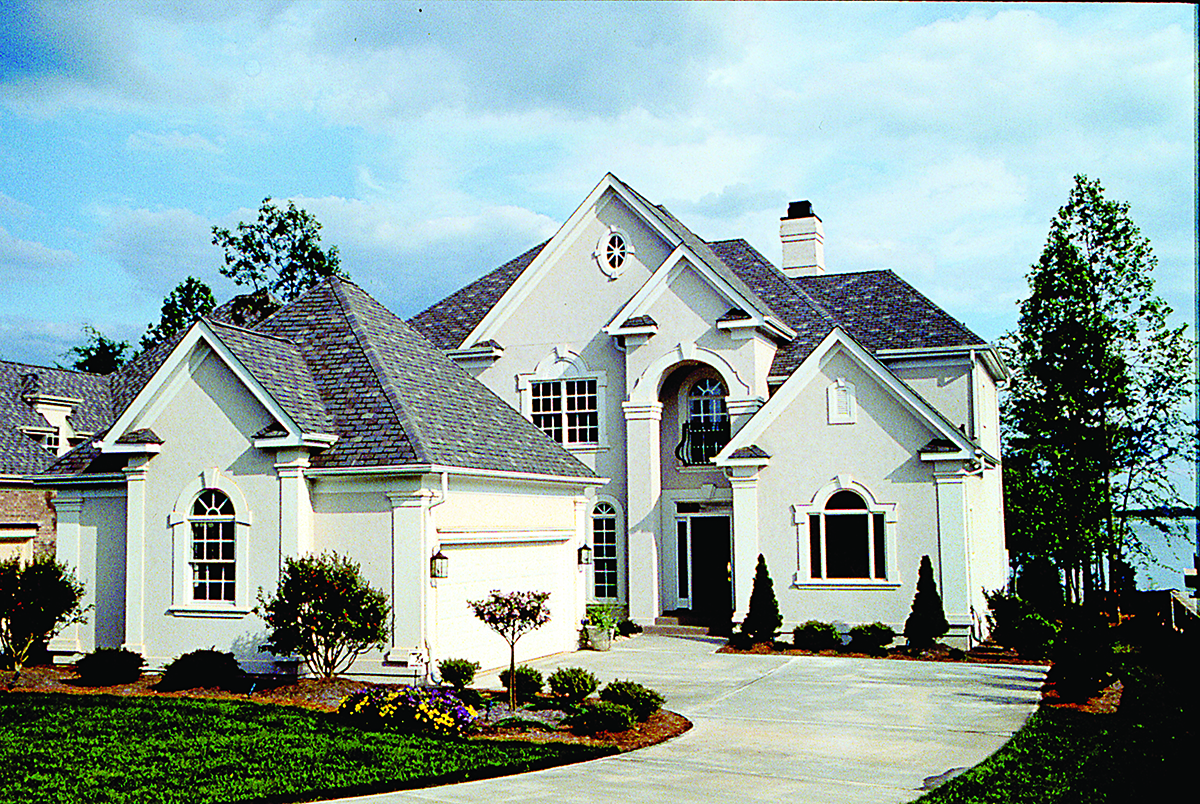 Front elevation of Traditional home (ThePlanCollection: House Plan #180-1012)