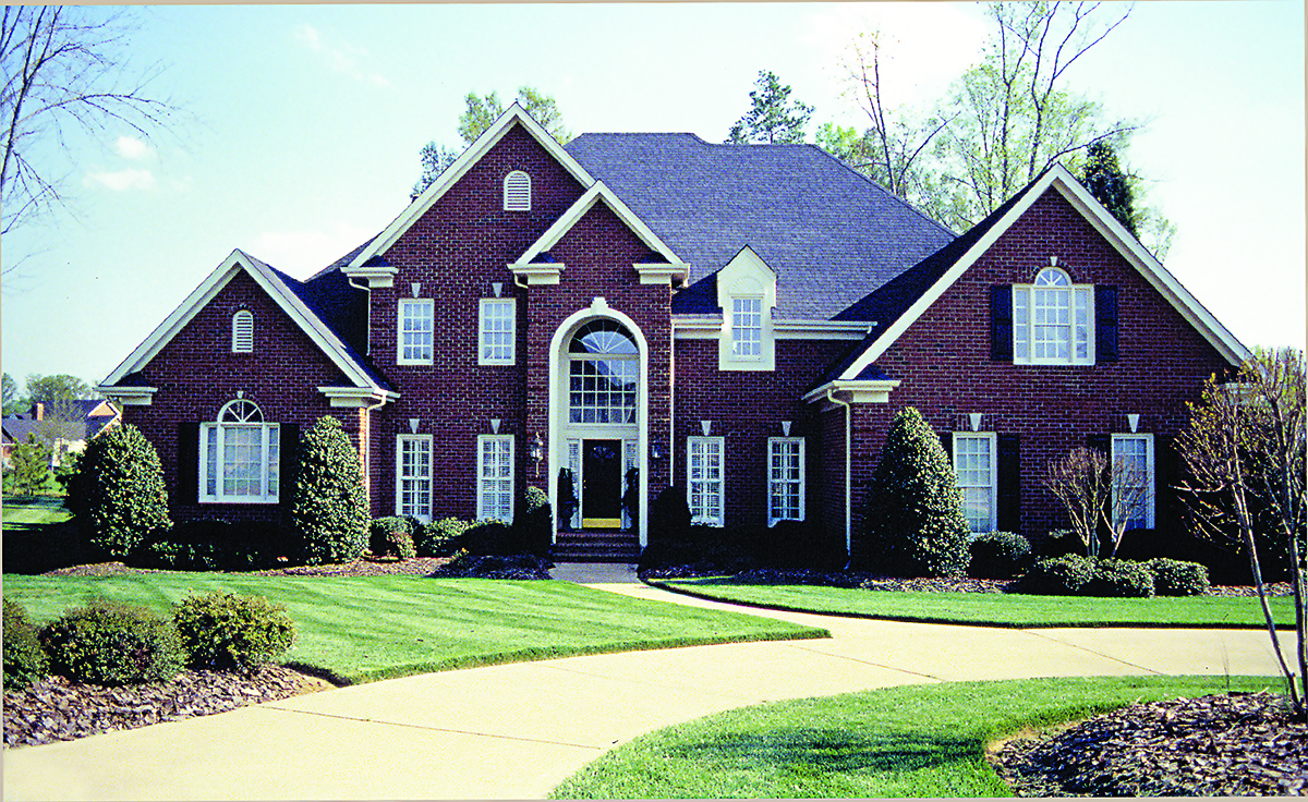 Front elevation of Traditional home (ThePlanCollection: House Plan #180-1016)