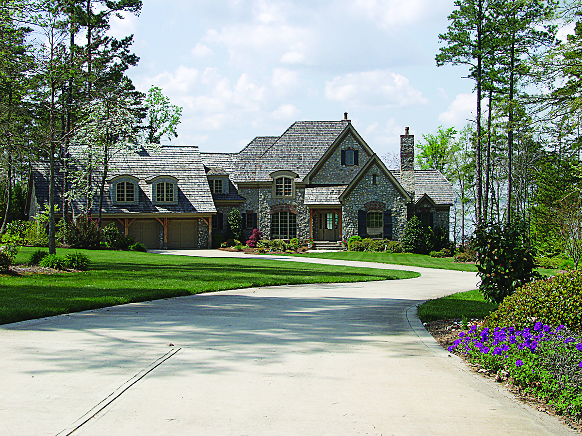 Photo of French Country manor with Arts and Crafts details (ThePlanCollection: House Plan #180-1021)