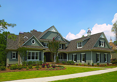 Front elevation of Shingle home (ThePlanCollection: House Plan #180-1028)