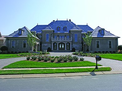Front elevation of European home (ThePlanCollection: House Plan #180-1033)