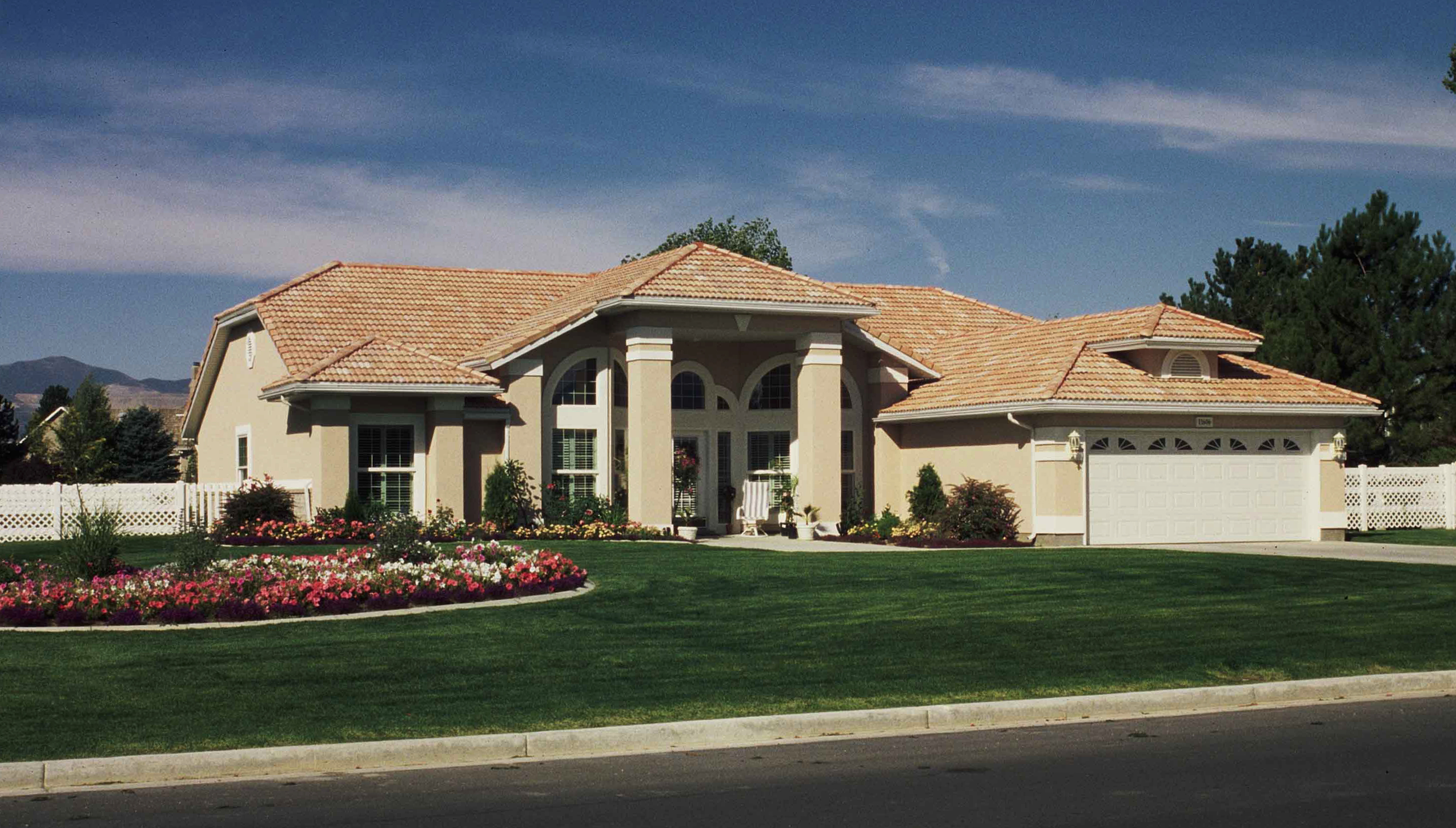 Front elevation photo of this contemporary home (ThePlanCollection: House Plan #190-1006)