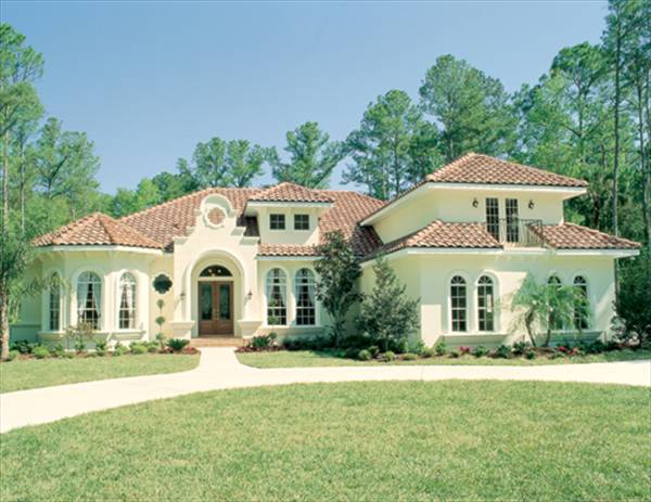 Front elevation photo of Spanish style home (ThePlanCollection: House Plan #190-1009)